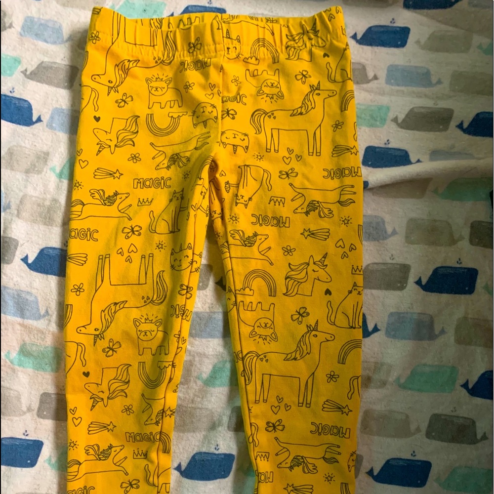 Yellow unicorn leggings never worn